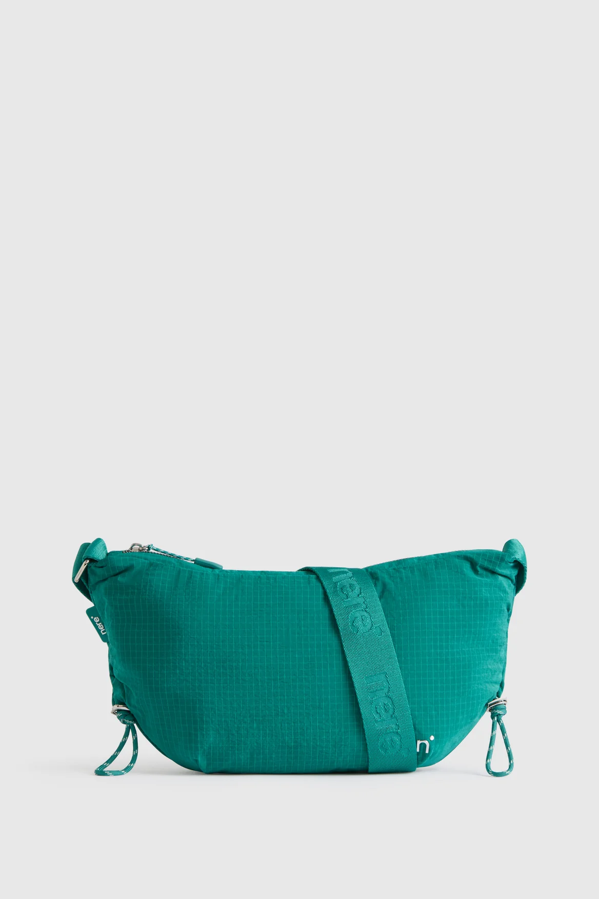 n.motion Crescent Sling Bag